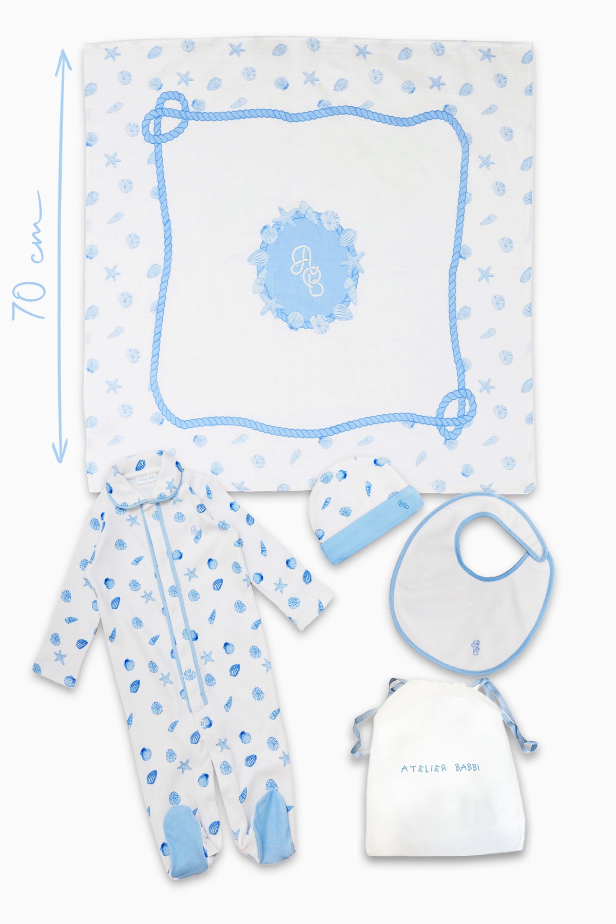 Organic cotton newborn gift set in Sea Shell pattern with jumpsuit, hat, bib, and swaddle