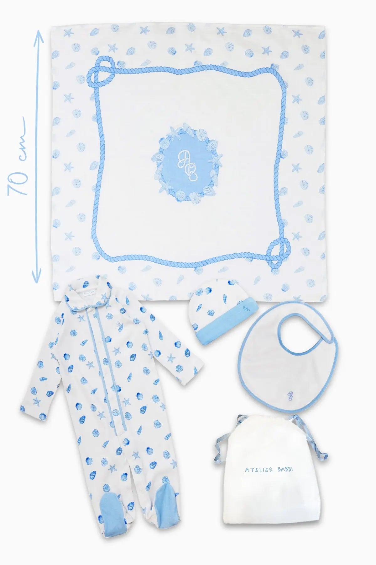 Organic cotton newborn gift set in Sea Shell pattern with jumpsuit, hat, bib, and swaddle