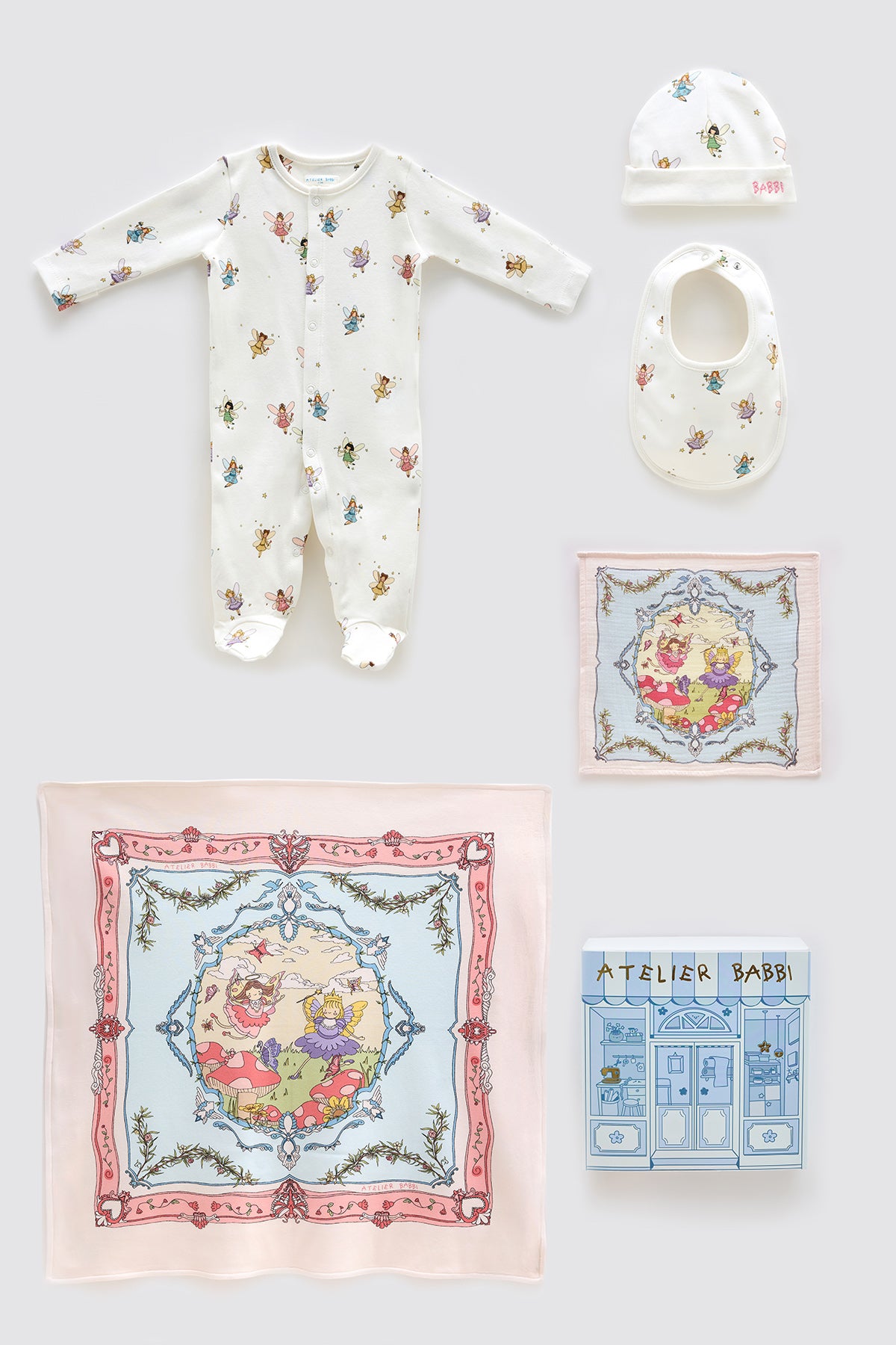 Fairy Tale themed 5 piece newborn baby gift set including onesie, bib, hat, muslin swaddle, and pouch – organic cotton, perfect for gifting.