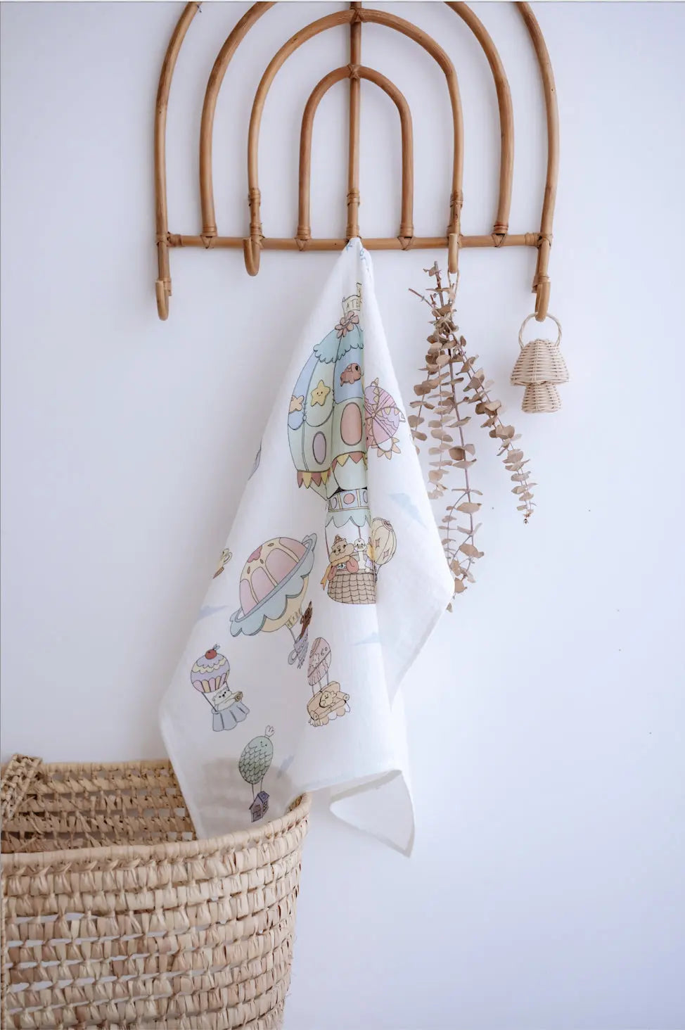 Muslin swaddle featuring hot air balloon design, ideal for newborns with sensitive skin
