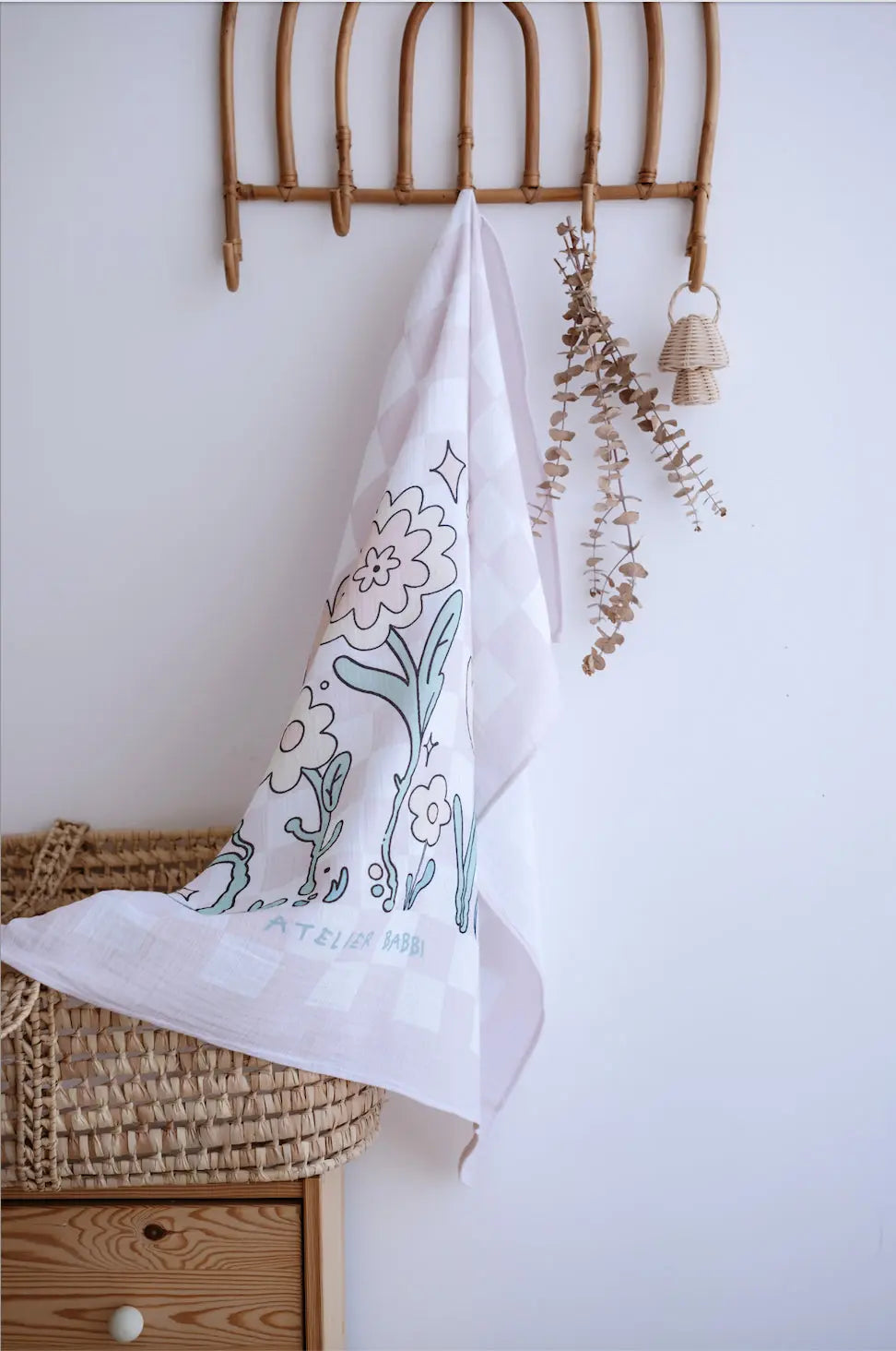 100% cotton muslin swaddle in checkered pattern – breathable and gentle for baby skin