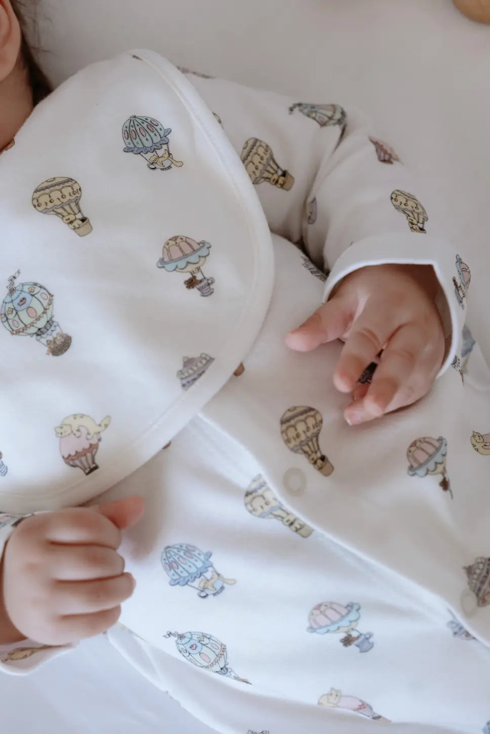 Whimsical baby sleeper with balloon design