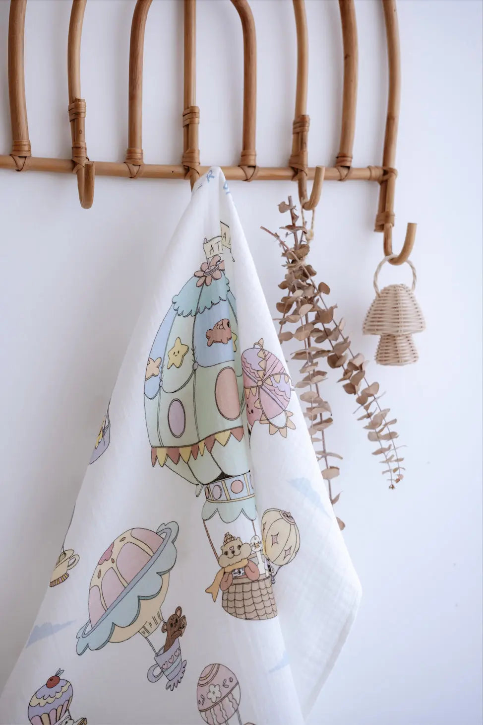 Muslin swaddle featuring hot air balloon design, ideal for newborns with sensitive skin
