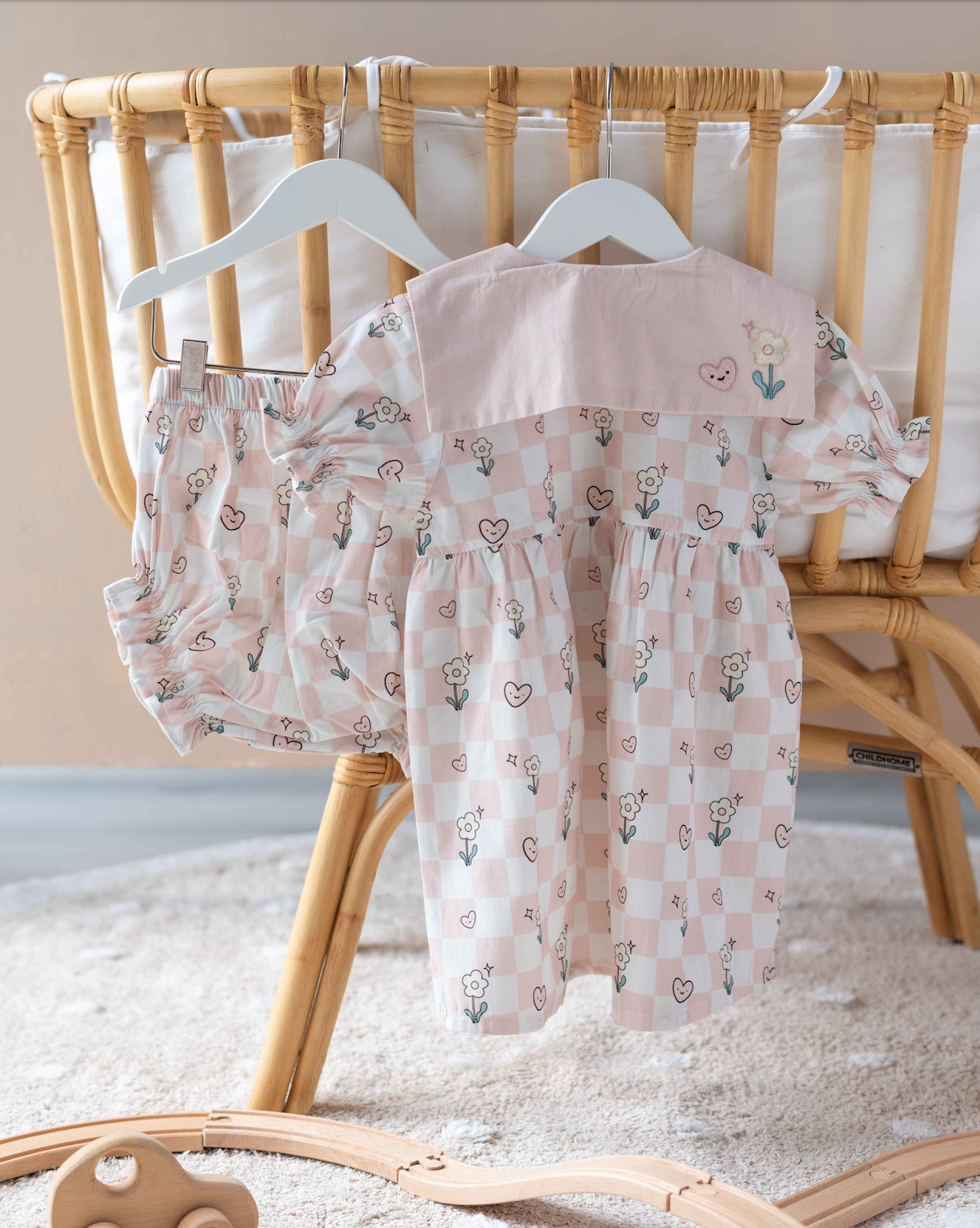 Lightweight check heart print baby dress ideal for summer days and special moments.