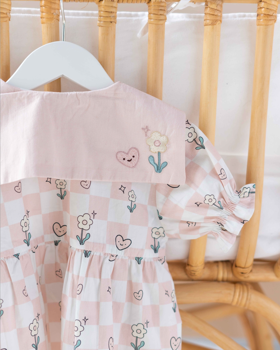 Classic pink and white checkered baby girl dress designed for stylish little ones.