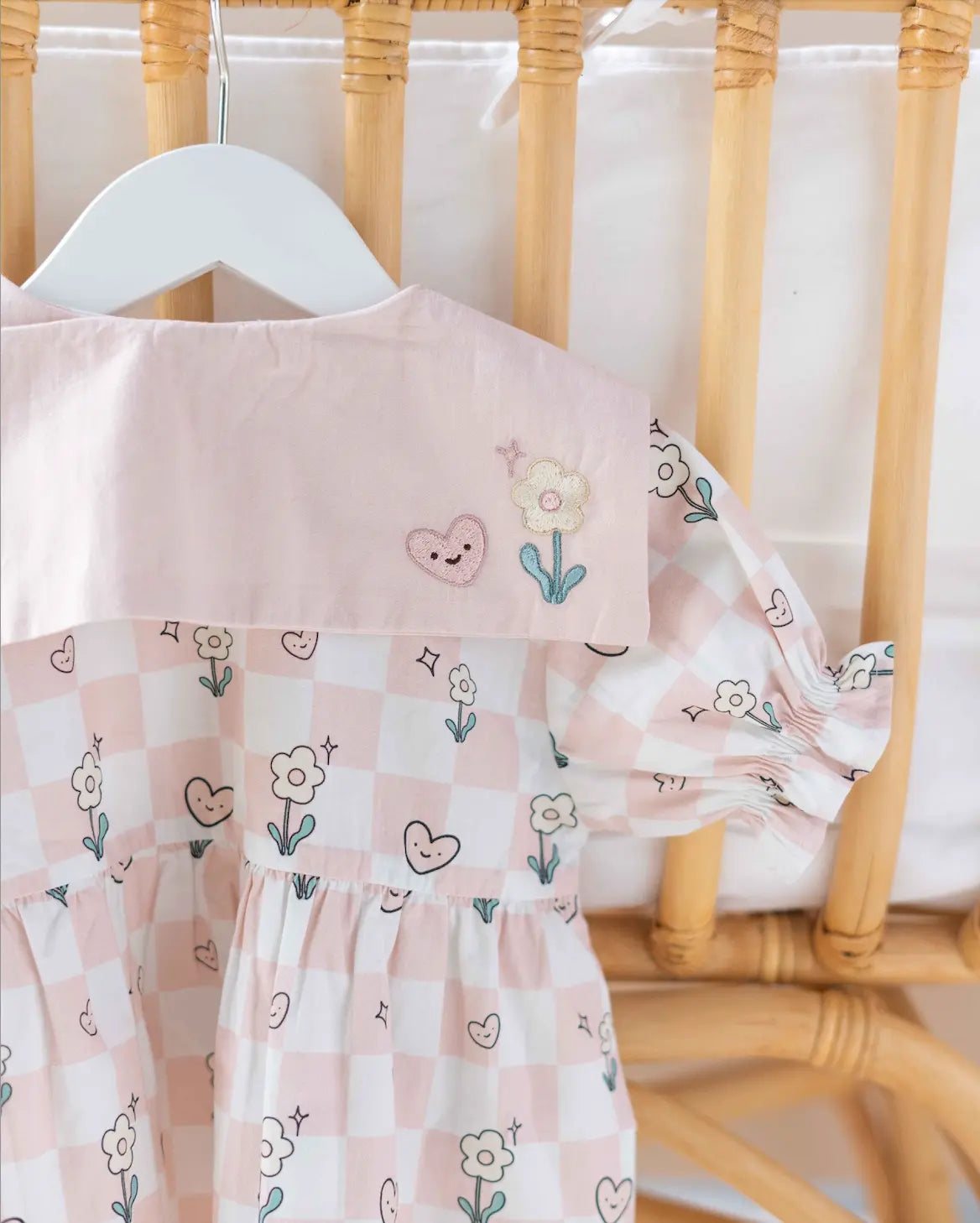 Classic pink and white checkered baby girl dress designed for stylish little ones.