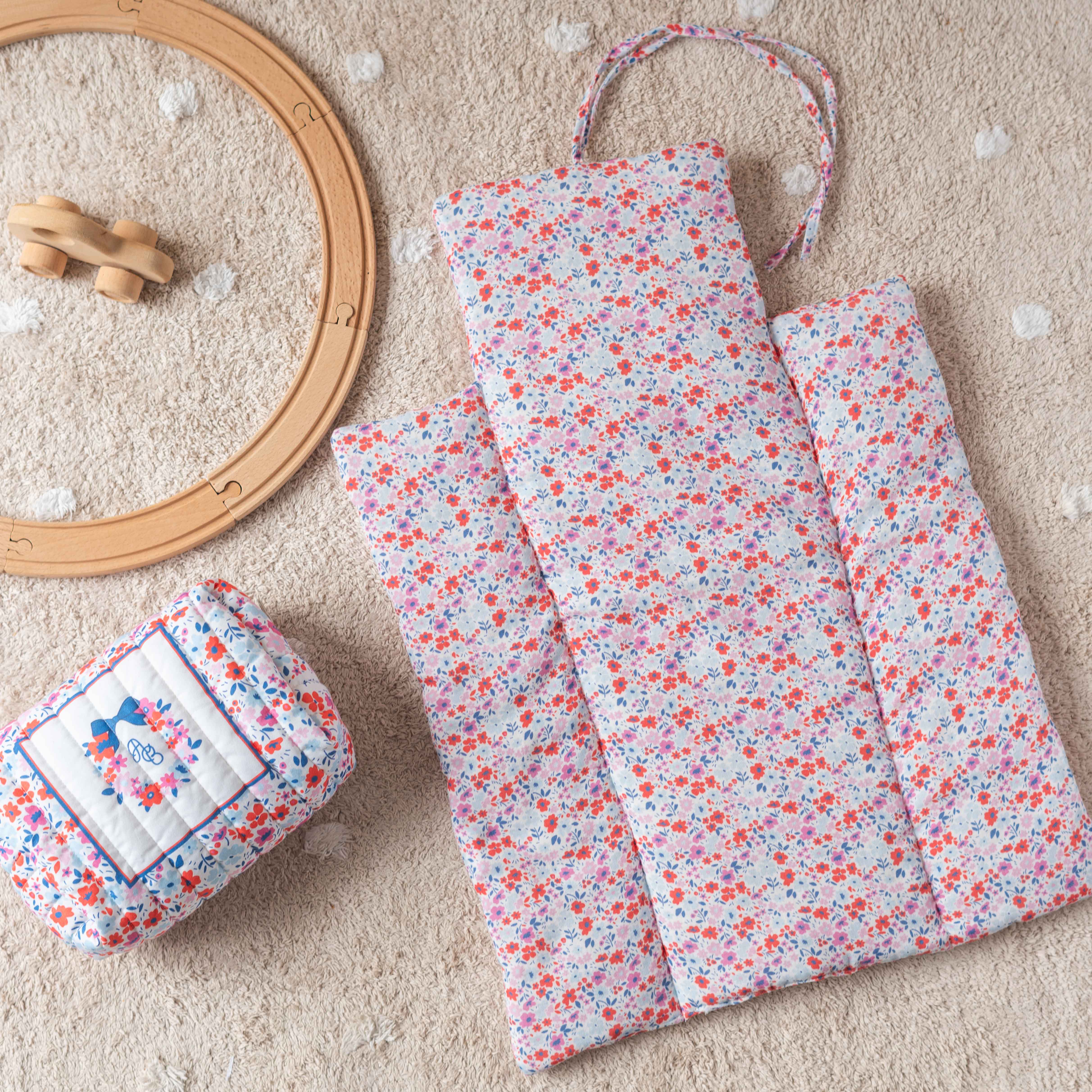 Red floral Tiny Flowers diaper changing mat and pouch set for babies – Atelier Babbi design