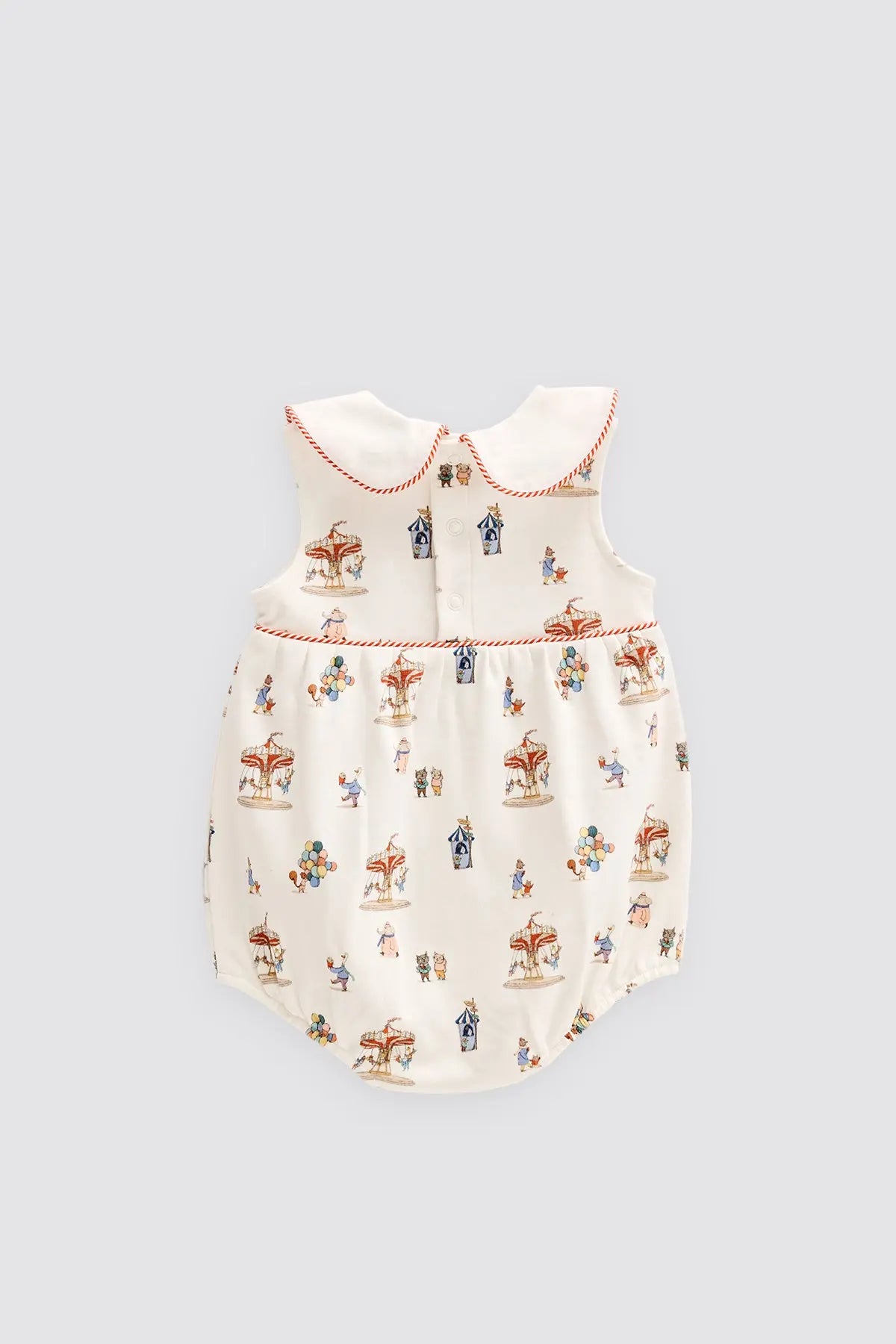 Baby romper with vintage toy Corousel on a light gray background