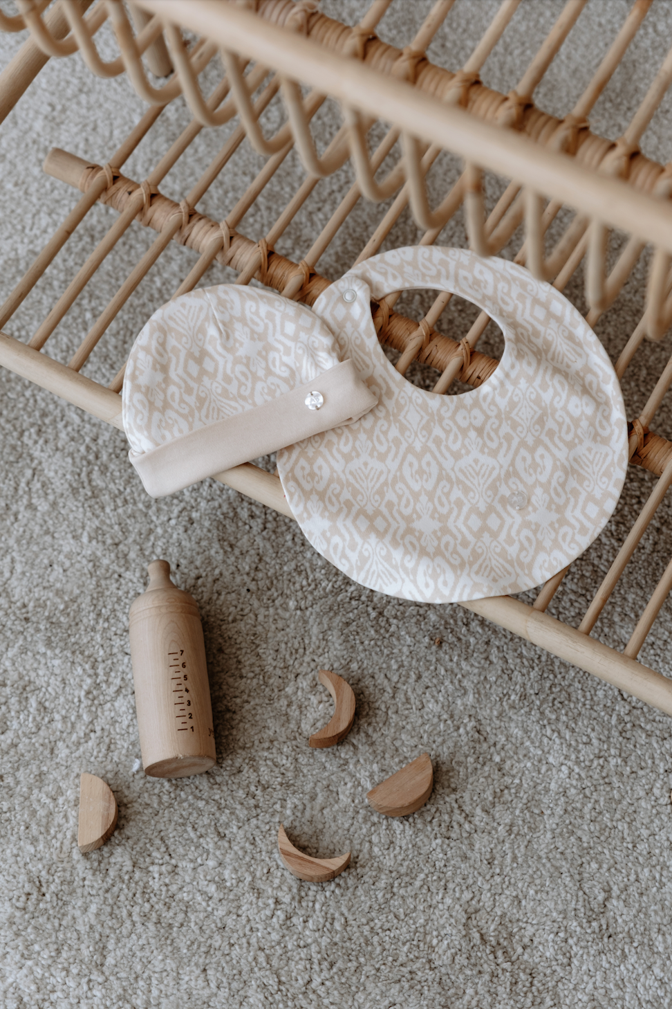 Organic cotton baby hat and bib in beige