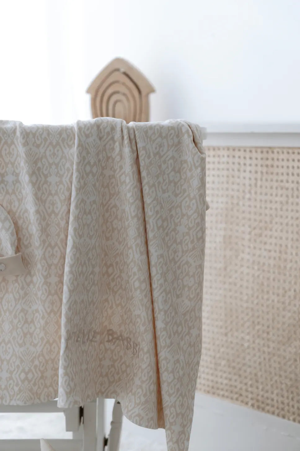 Beige cotton baby blanket with double-sided design