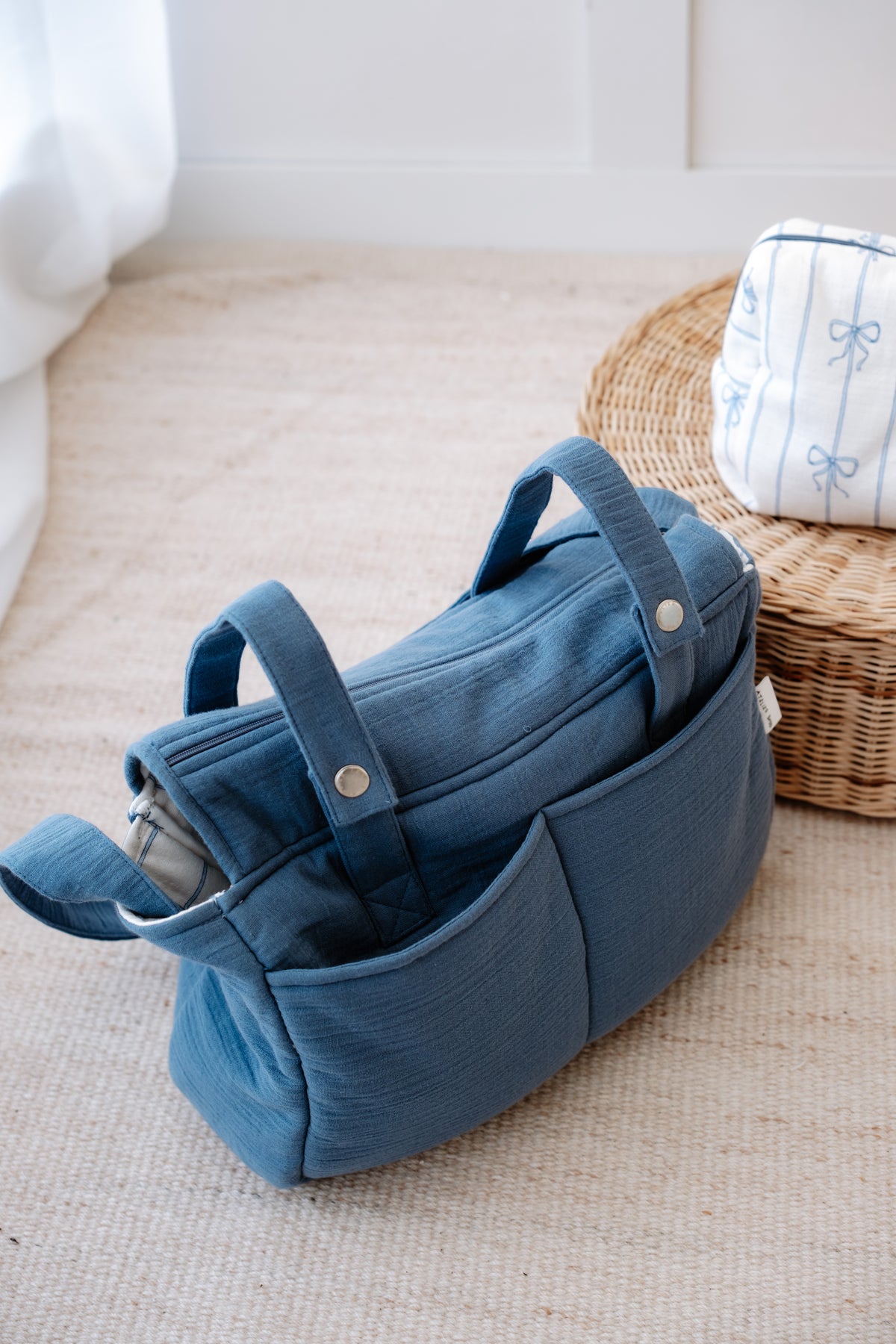 Close-up of soft muslin fabric texture on Atelier Babbi diaper bag