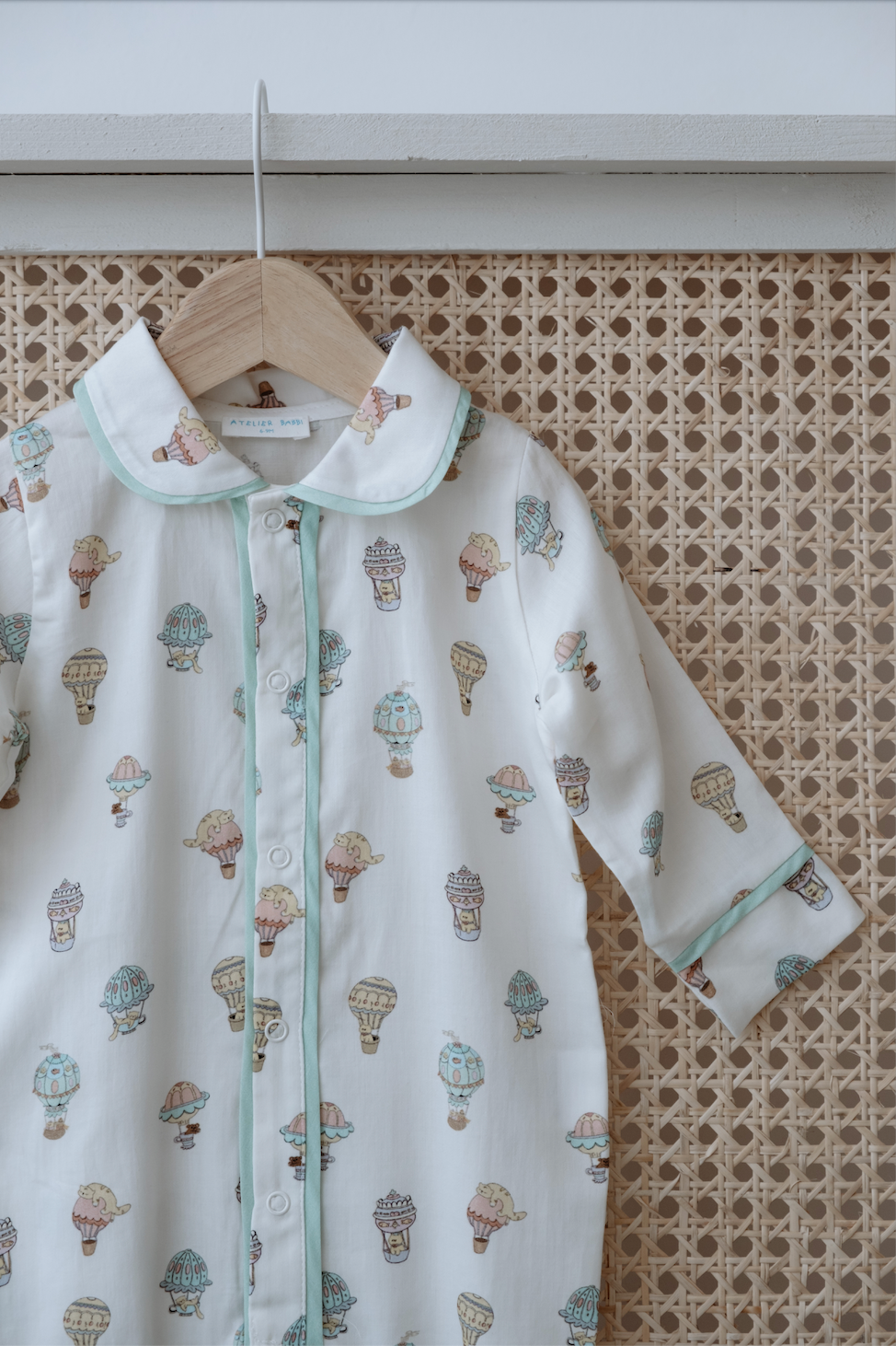 Soft newborn jumpsuit with playful balloon print