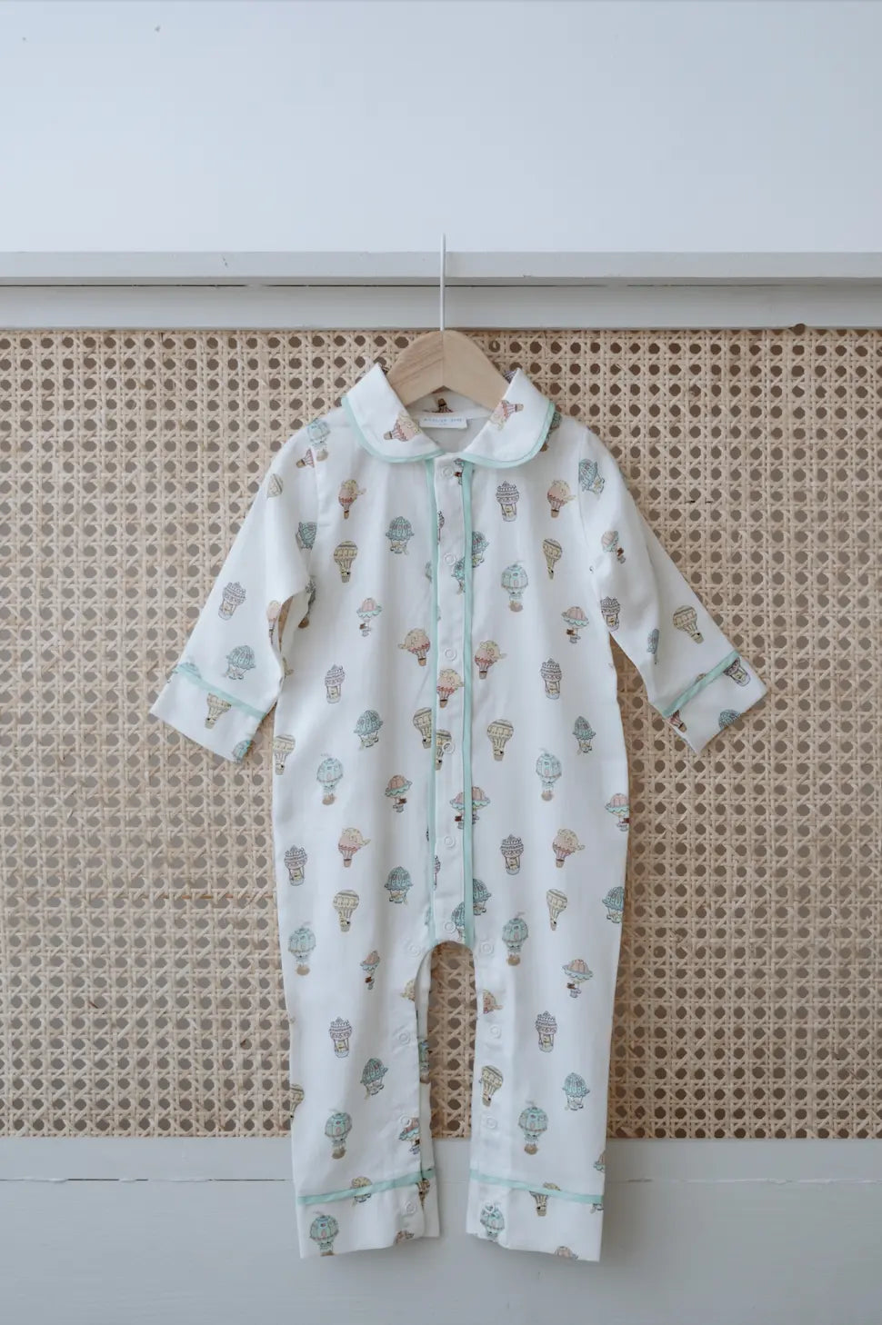 Whimsical sky-themed cotton one-piece