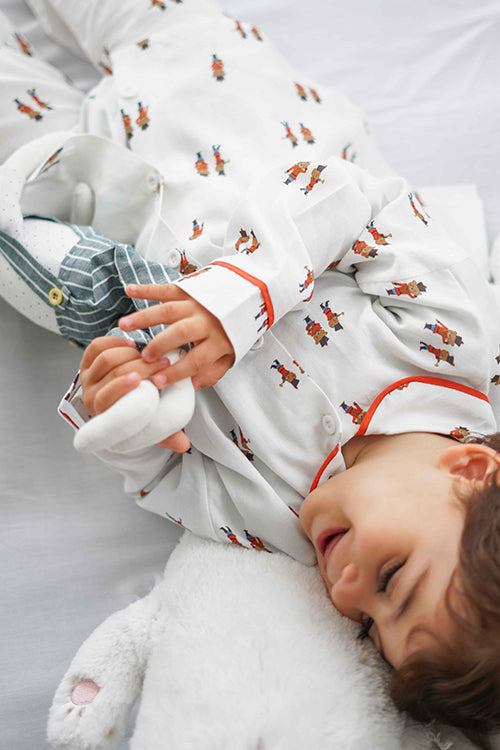 Organic cotton baby pajamas with toy soldier pattern