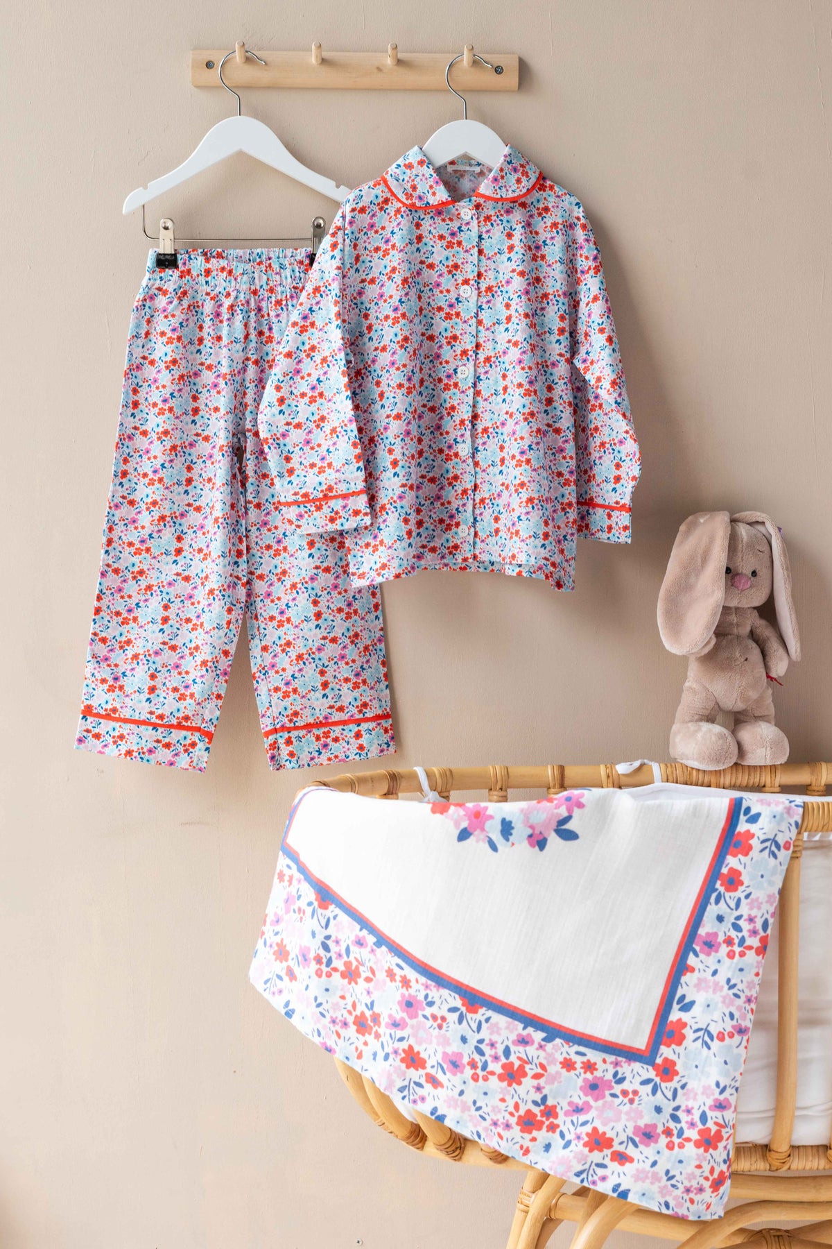 Organic cotton pajama set with colorful flower print for toddlers