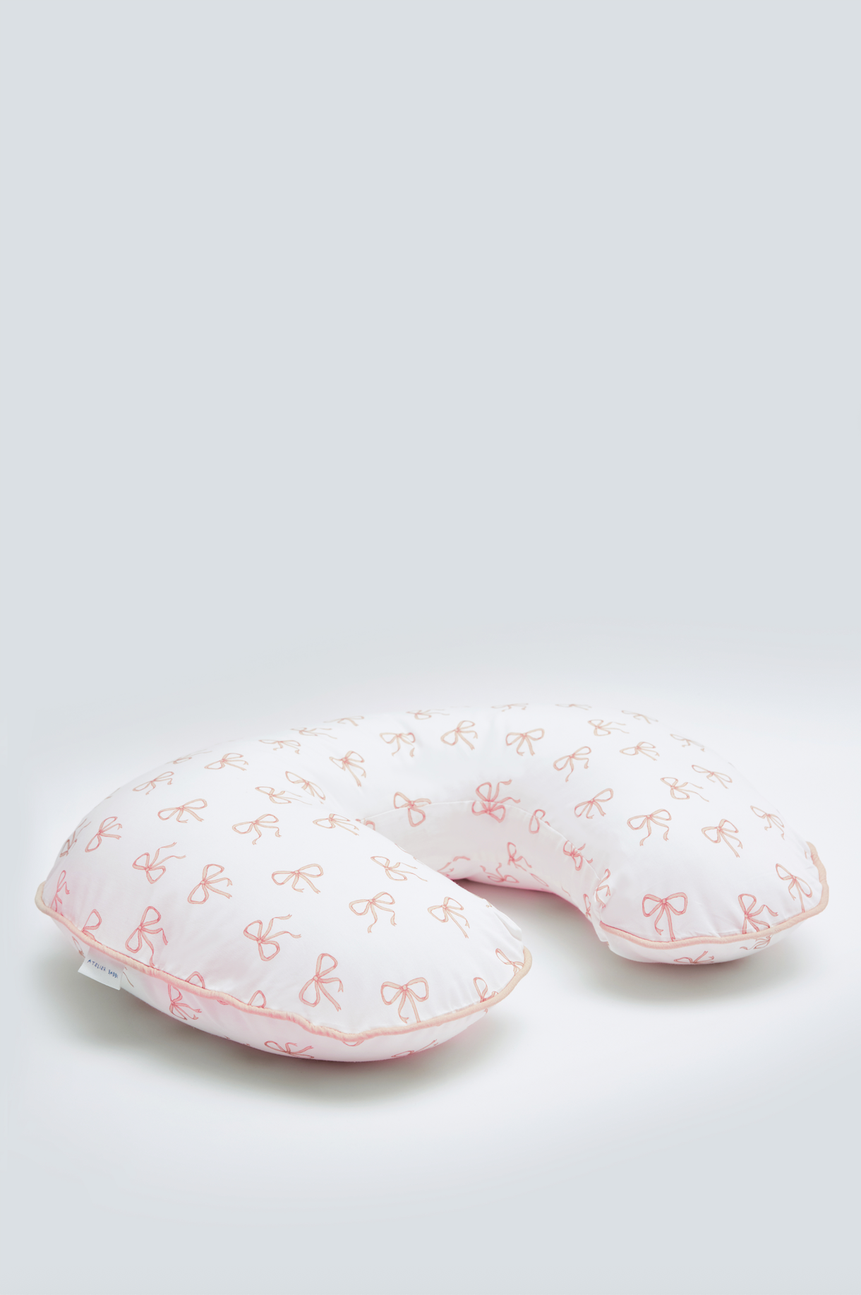 Pink ribbon nursing pillow
