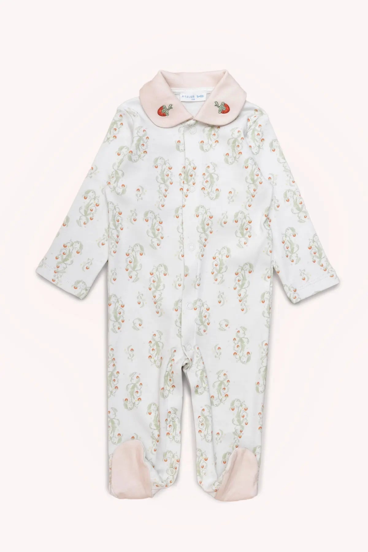 Cozy footed outfit for babies with strawberry print