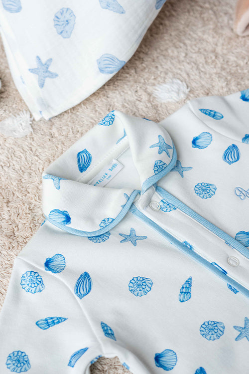 Sea shell themed baby footed onesie