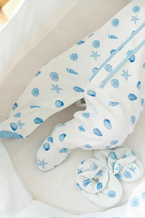 Organic cotton newborn bodysuit in coastal print