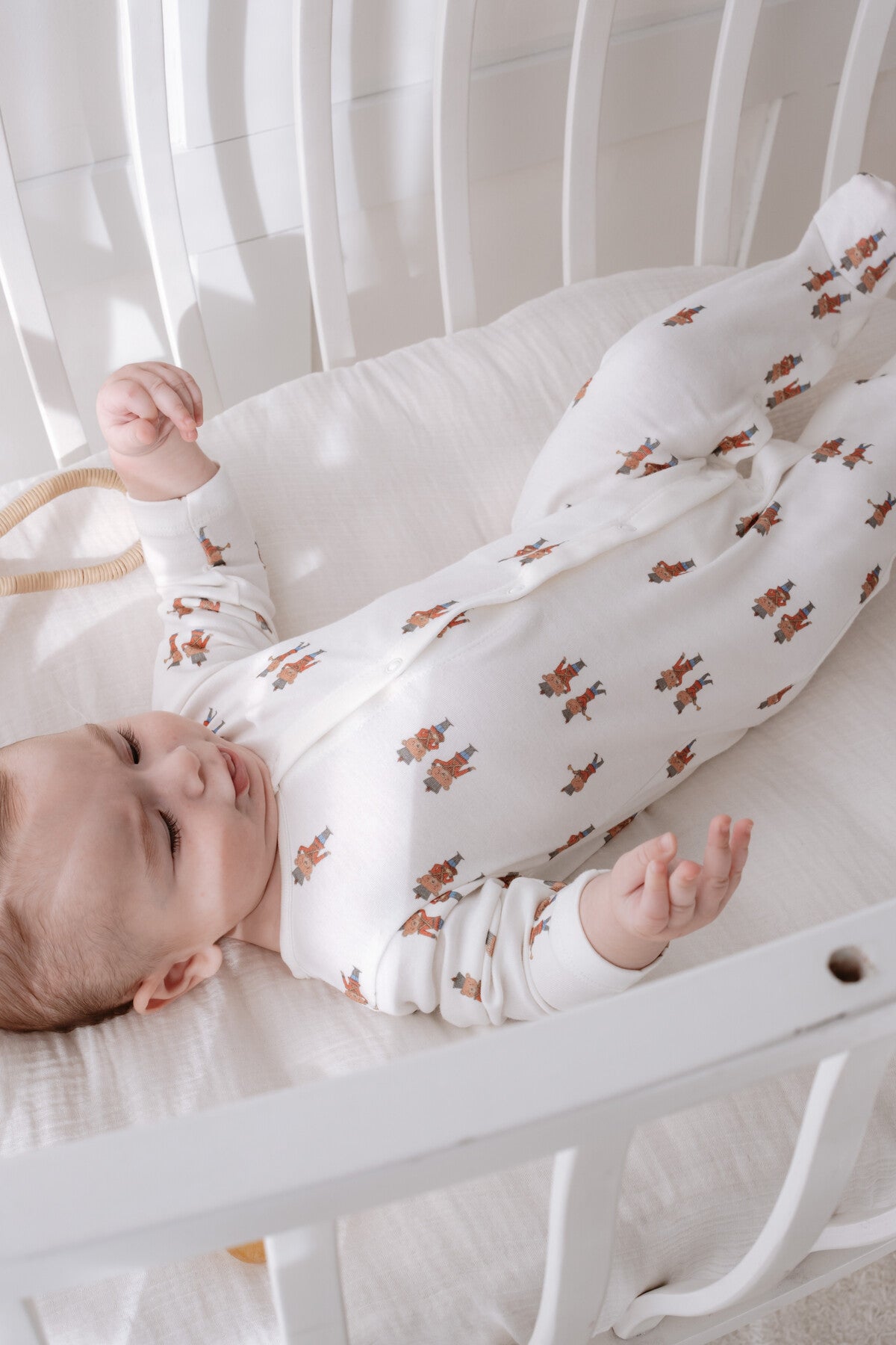 Tin Soldier baby footed onesie in organic cotton