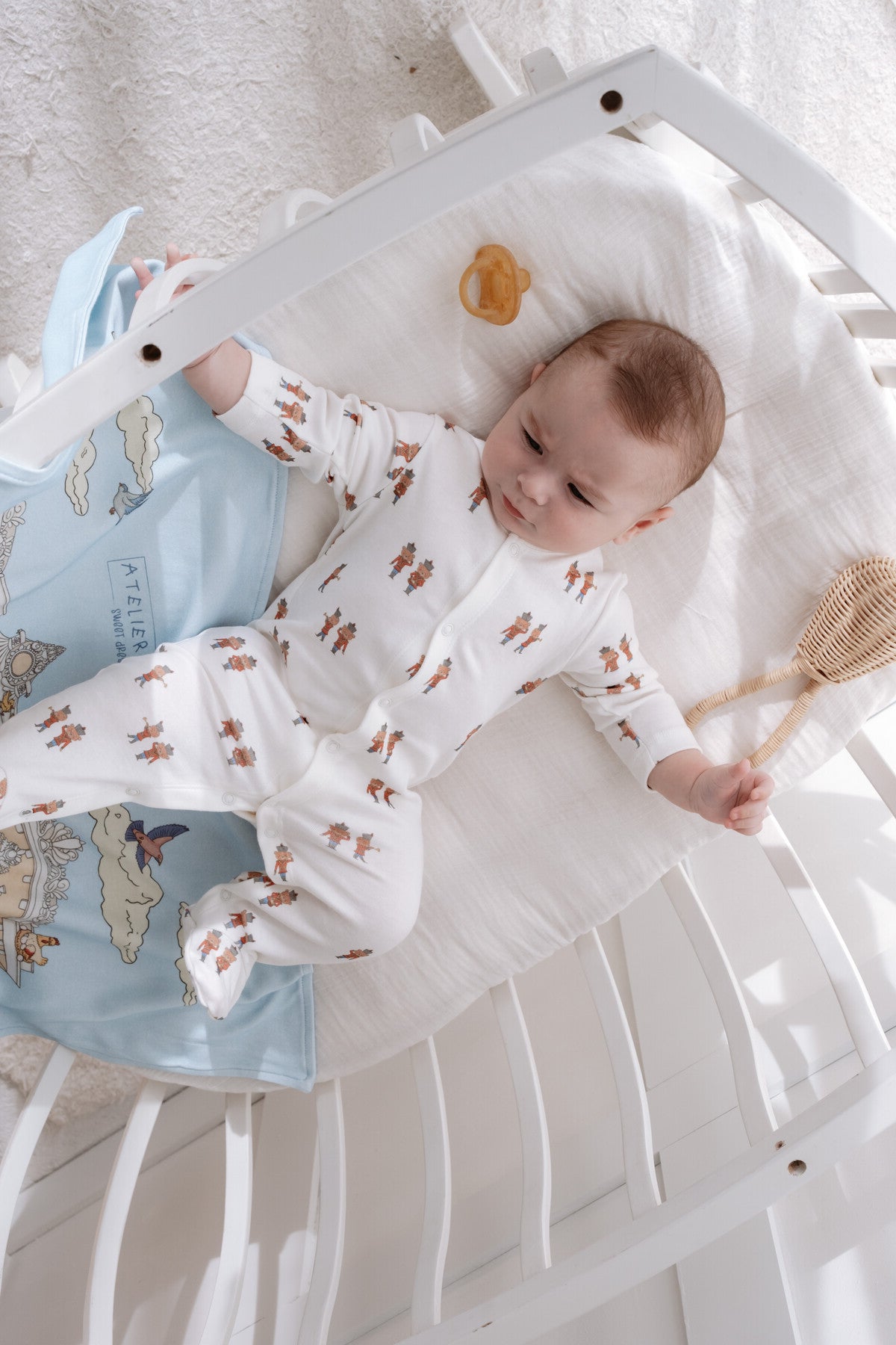 Cozy footed bodysuit with toy soldier design