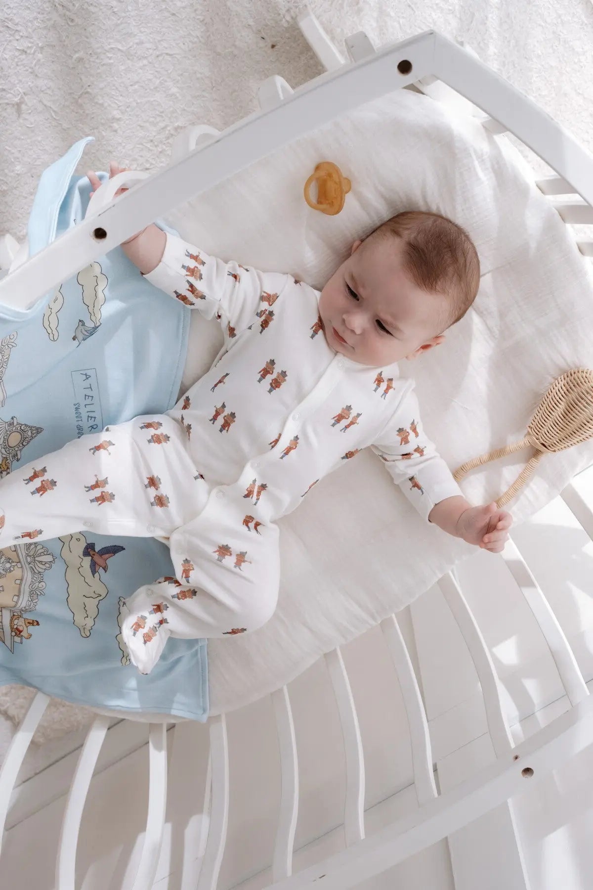 Cozy footed bodysuit with toy soldier design