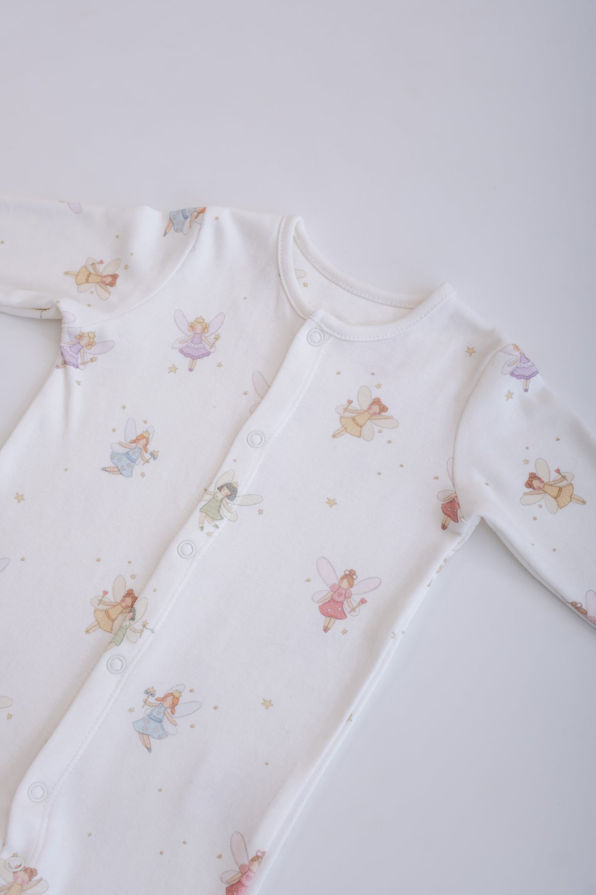 Storybook inspired footed bodysuit