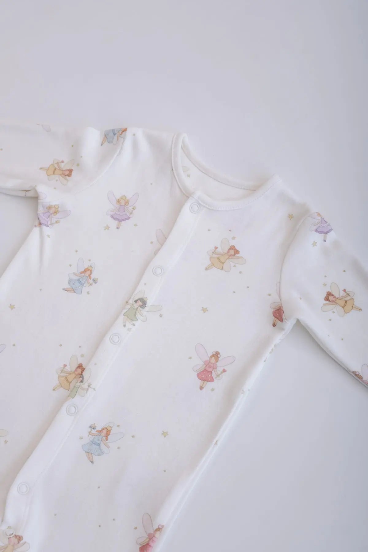 Storybook inspired footed bodysuit