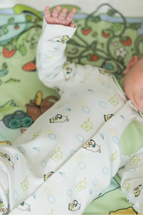 Organic cotton infant sleeper inspired by outdoor days