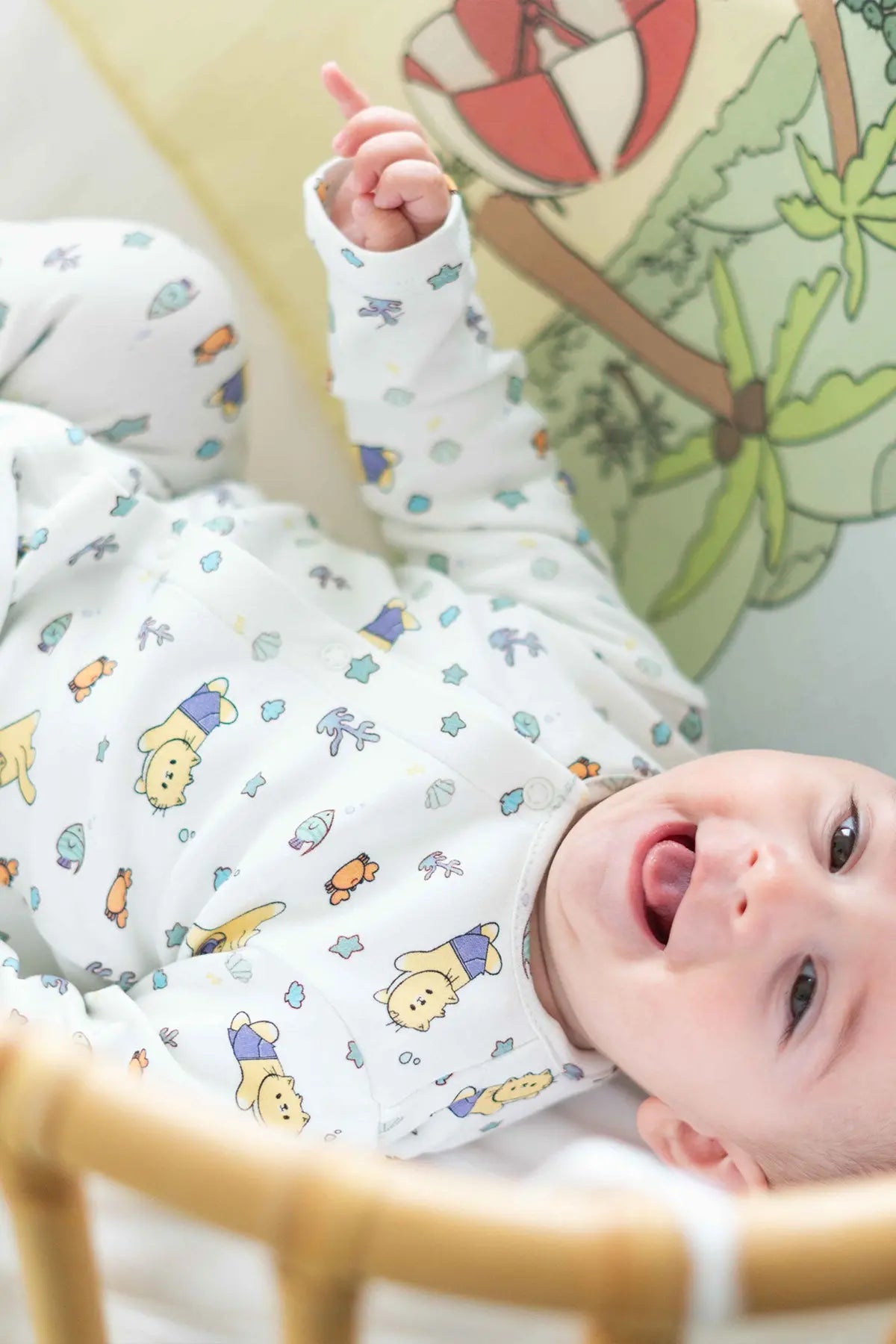 Coastal theme baby footed onesie for newborns