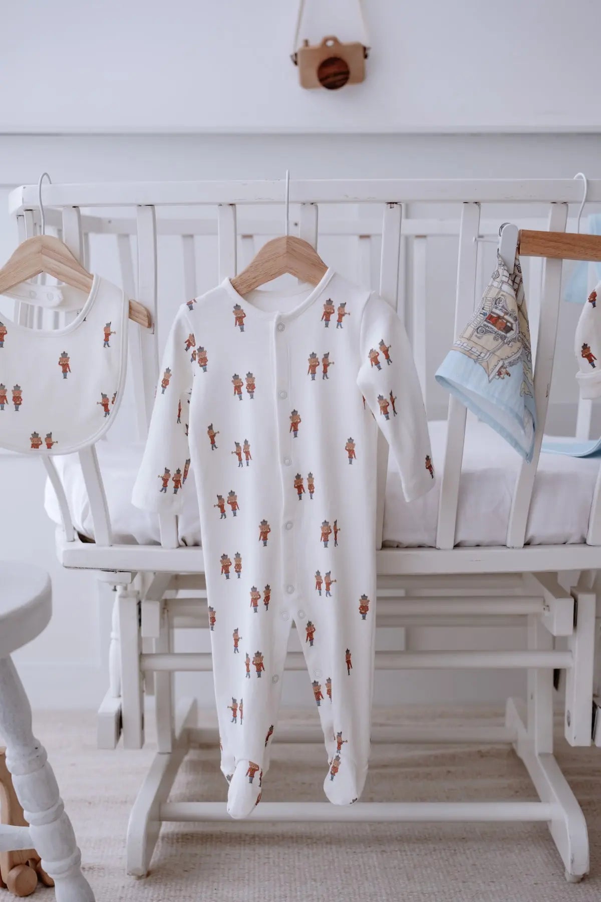 Organic cotton newborn onesie Tin Soldier print detail